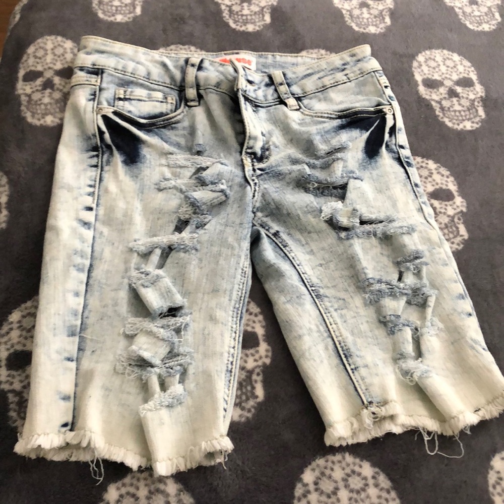Long ripped shorts
